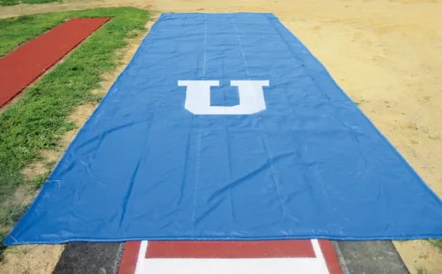 weighted jump pit cover with printed logo