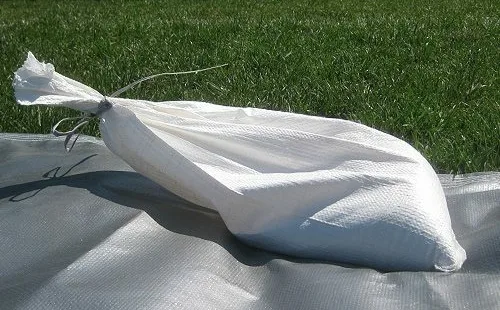 sandbag secures fieldsaver field tarp