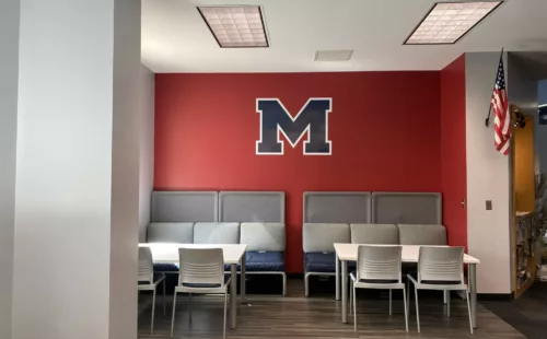 School facility wall graphics with custom lettering and team branding