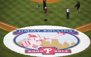 Jimmy Rollins in front of ceremonial printed spot cover